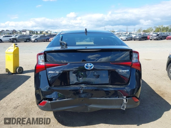 2021 Toyota Prius L Eco with VIN JTDKAMFU6M3135799, listed as a IAAI auction lot 42064241 with 77,120 mi miles and . Bid and sale history available at DreamBid. Image 6.