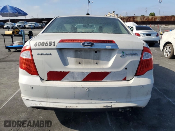 2012 Ford Fusion Hybrid z VIN 3FADP0L38CR171141, wystawiony jako Copart lot #61492425 z przebiegiem 275 312 mil mil oraz Czysty tytuł • Clean title. Historia ofert i sprzedaży dostępna na DreamBid. Obrazek 6.