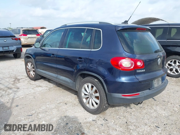 2011 Volkswagen Tiguan SE with VIN WVGAV7AX7BW530357, listed as a IAAI auction lot 42740821 with 170,636 mi miles and . Bid and sale history available at DreamBid. Image 3.