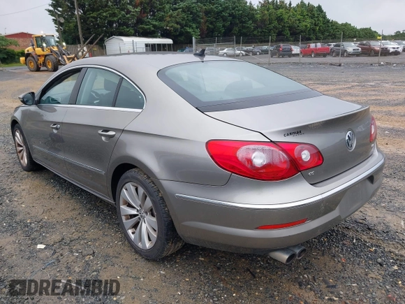 2012 Volkswagen CC R-Line z VIN WVWMP7AN2CE503052, wystawiony jako IAAI lot #42521596 z przebiegiem 136 930 mil mil oraz . Historia ofert i sprzedaży dostępna na DreamBid. Obrazek 3.