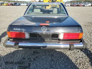1989 Mercedes-Benz 560 560SL with VIN WDBBA48D8KA101576, listed as a Copart auction lot 75503004 with 68,911 mi miles and Salvage Title. Bid and sale history available at carsss.com. Image 6.