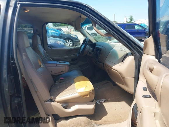 1998 Ford F-150 with VIN 1FTZX1762WNB88647, listed as a IAAI auction lot 42682271 with 187,520 mi miles and . Bid and sale history available at DreamBid. Image 5.
