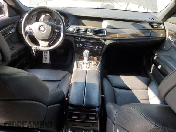 2011 BMW 7 Series 740i with VIN WBAKA4C52BC612977, listed as a Copart auction lot 52582575 with 157,813 mi miles and Salvage Title. Bid and sale history available at carsss.com. Image 8.
