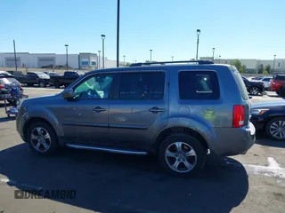 2014 Honda Pilot EX-L with VIN 5FNYF3H52EB015806, listed as a IAAI auction lot 41676586 with 193,215 mi miles and . Bid and sale history available at carsss.com. Image 15.