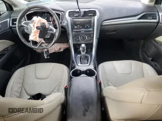 2015 Ford Fusion Titanium Hybrid with VIN 3FA6P0RUXFR247357, listed as a Copart auction lot 55943975 with 112,278 mi miles and Salvage title. Bid and sale history available at DreamBid. Image 8.