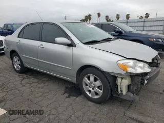 2004 Toyota Corolla CE with VIN 1NXBR32E34Z297414, listed as a Copart auction lot 52541105 with 147,072 mi miles and Salvage Title. Bid and sale history available at DreamBid. Image 4.
