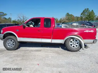 2000 Ford F-150 XL with VIN 1FTRX18L1YNC06272, listed as a IAAI auction lot 41780486 with 295,611 mi miles. Bid and sale history available at carsss.com. Image 15.