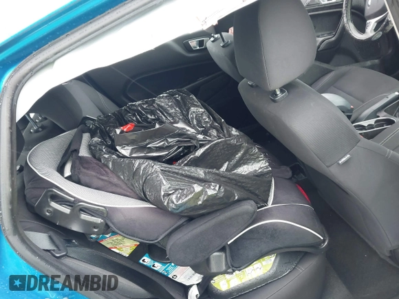 2015 Ford Fiesta SE z VIN 3FADP4EJ9FM133020, wystawiony jako IAAI lot #42302738 z przebiegiem 115 669 mil mil oraz . Historia ofert i sprzedaży dostępna na DreamBid. Obrazek 8.