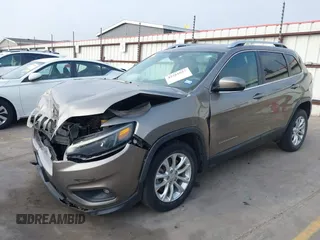 2019 Jeep Cherokee Latitude with VIN 1C4PJLCBXKD416644, listed as a IAAI auction lot 42261057 with 93,849 mi miles and . Bid and sale history available at DreamBid. Image 2.