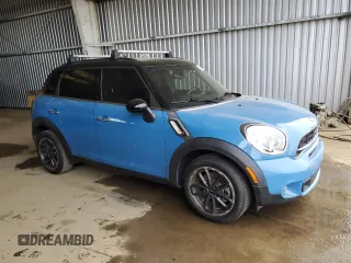 2016 MINI Countryman S with VIN WMWZC3C50GWT10905, listed as a Copart auction lot 47138895 with 59,649 mi miles and Salvage Title. Bid and sale history available at DreamBid. Image 4.