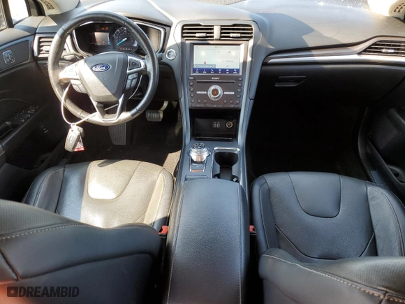 2020 Ford Fusion Plug-In Hybrid Titanium with VIN 3FA6P0SUXLR101997, listed as a Copart auction lot 69575324 with 74,121 mi miles and Salvage Title. Bid and sale history available at carsss.com. Image 8.