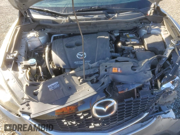 2014 Mazda CX-5 Sport with VIN JM3KE2BE1E0350718, listed as a Copart auction lot 46370205 with 98,065 mi miles and Salvage title. Bid and sale history available at DreamBid. Image 13.