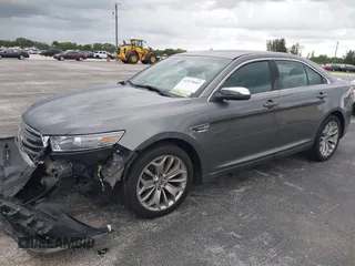 2014 Ford Taurus Limited with VIN 1FAHP2F8XEG115507, listed as a IAAI auction lot 42479603 with 160,986 mi miles and . Bid and sale history available at DreamBid. Image 2.