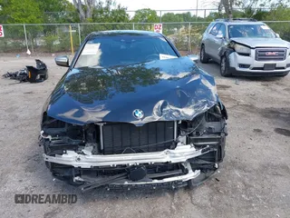 2019 BMW 5 Series M550i xDrive with VIN WBAJB9C51KB289355, listed as a IAAI auction lot 41867984 with 30,106 mi miles and . Bid and sale history available at DreamBid. Image 12.