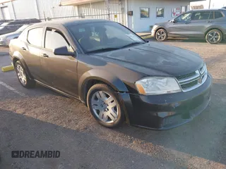 2014 Dodge Avenger SE with VIN 1C3CDZABXEN144000, listed as a IAAI auction lot 41878635 with 153,097 mi miles. Bid and sale history available at carsss.com. Image 1.