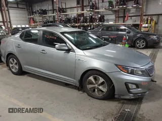 2014 Kia Optima Hybrid LX with VIN KNAGM4AD4E5068904, listed as a IAAI auction lot 41236015 with 160,456 mi miles. Bid and sale history available at carsss.com. Image 1.