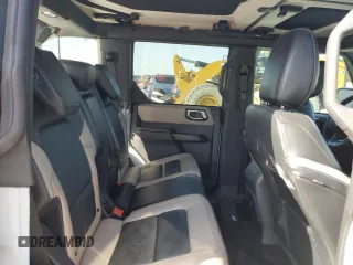 2024 Ford Bronco Wildtrak с VIN 1FMEE2BPXRLB16732, выставлен на аукционе Copart как лот 56394005 с пробегом 8 428 миль миль и Списание • Salvage title. История ставок и продаж доступна на DreamBid. Изображение 11.