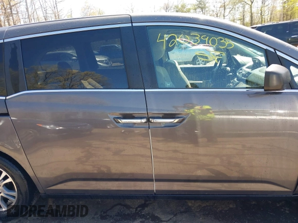 2012 Honda Odyssey EX-L with VIN 5FNRL5H68CB006686, listed as a IAAI auction lot 42039035 with 338,331 mi miles and . Bid and sale history available at carsss.com. Image 13.