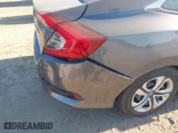 2016 Honda Civic Sedan LX with VIN 2HGFC2F55GH546980, listed as a IAAI auction lot 41378567 with 145,091 mi miles. Bid and sale history available at carsss.com. Image 17.