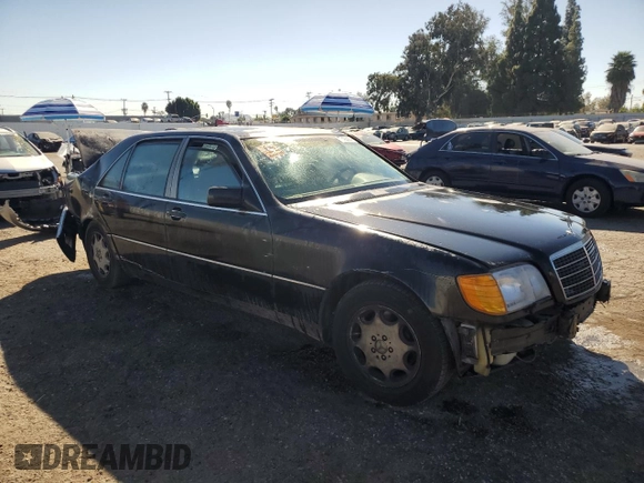1994 Mercedes-Benz S with VIN WDBGA51E2RA184222, listed as a Copart auction lot 77403664 with 109,428 mi miles and Salvage Title. Bid and sale history available at DreamBid. Image 4.