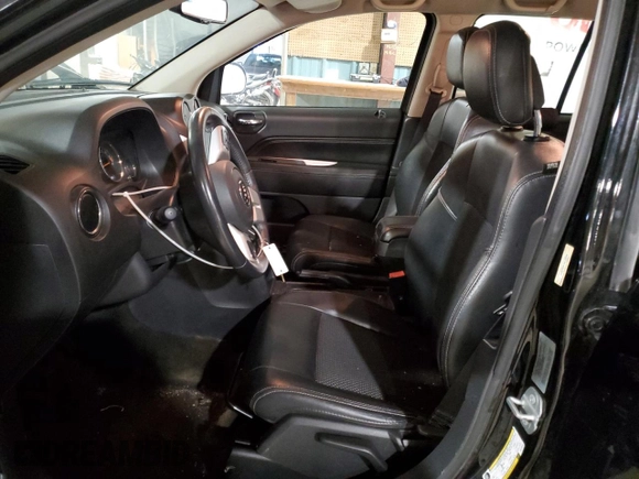 2017 Jeep Compass Latitude with VIN 1C4NJDEB7HD106048, listed as a Copart auction lot 56716925 with 208,777 mi miles and Salvage title. Bid and sale history available at DreamBid. Image 7.
