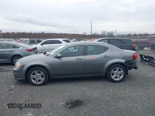 2013 Dodge Avenger SXT with VIN 1C3CDZCB6DN568480, listed as a IAAI auction lot 38104186 with 129,203 mi miles and . Bid and sale history available at DreamBid. Image 14.