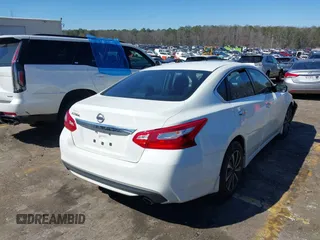 2016 Nissan Altima SR with VIN 1N4AL3AP6GC145745, listed as a IAAI auction lot 41737443 with 101,545 mi miles and . Bid and sale history available at DreamBid. Image 4.