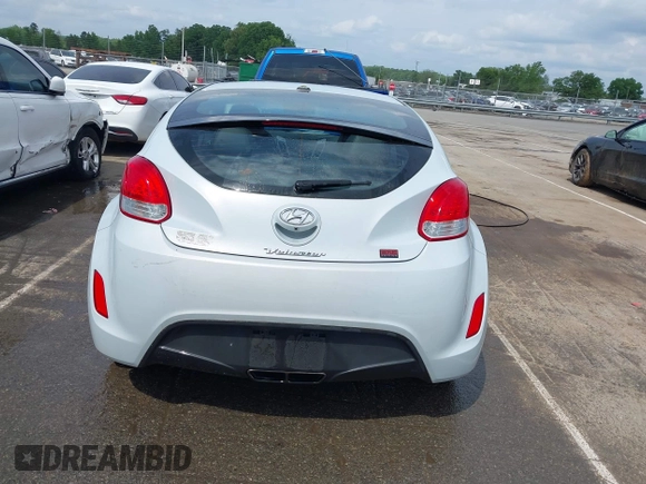 2015 Hyundai Veloster z VIN KMHTC6AD8FU222744, wystawiony jako IAAI lot #42129397 z przebiegiem Nie podano mil oraz . Historia ofert i sprzedaży dostępna na DreamBid. Obrazek 15.