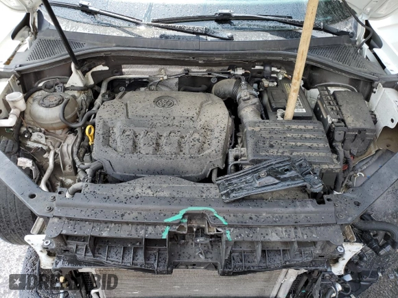 2018 Volkswagen Tiguan S with VIN 3VV0B7AX6JM094609, listed as a Copart auction lot 59550215 with 118,975 mi miles and Salvage title. Bid and sale history available at DreamBid. Image 12.