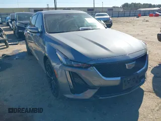 2021 Cadillac CT5 Sport z VIN 1G6DP5RK6M0128539, wystawiony jako IAAI lot #41418733 z przebiegiem 25 332 mil mil oraz . Historia ofert i sprzedaży dostępna na DreamBid. Obrazek 1.