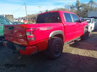 2024 Nissan Frontier SV with VIN 1N6ED1EK6RN609634, listed as a IAAI auction lot 41187993 with 21,034 mi miles and . Bid and sale history available at DreamBid. Image 4.