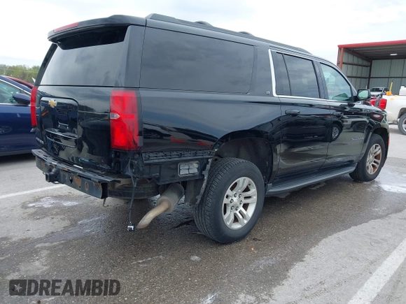 2016 Chevrolet Suburban LT z VIN 1GNSKHKC7GR315884, wystawiony jako IAAI lot #41977108 z przebiegiem 138 902 mil mil oraz . Historia ofert i sprzedaży dostępna na DreamBid. Obrazek 4.