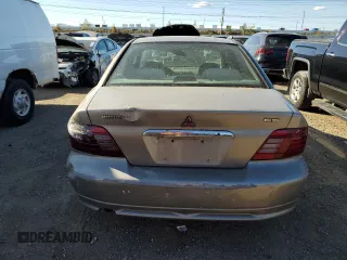 2001 Mitsubishi Galant ES z VIN 4A3AA46G71E214935, wystawiony jako Copart lot #77423604 z przebiegiem Nie podano mil oraz Czysty tytuł • Clean title. Historia ofert i sprzedaży dostępna na DreamBid. Obrazek 6.