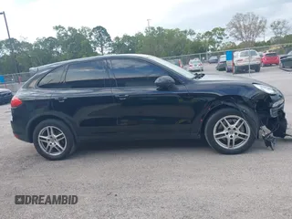 2014 Porsche Cayenne with VIN WP1AA2A28ELA06484, listed as a IAAI auction lot 41655867 with 179,441 mi miles and . Bid and sale history available at DreamBid. Image 13.