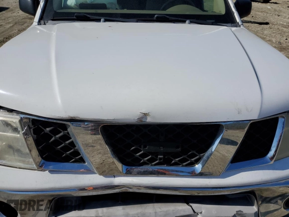 2007 Nissan Frontier SE z VIN 1N6AD06U97C410014, wystawiony jako Copart lot #46402375 z przebiegiem 172 136 mil mil oraz Szkoda całkowita • Salvage title. Historia ofert i sprzedaży dostępna na DreamBid. Obrazek 13.