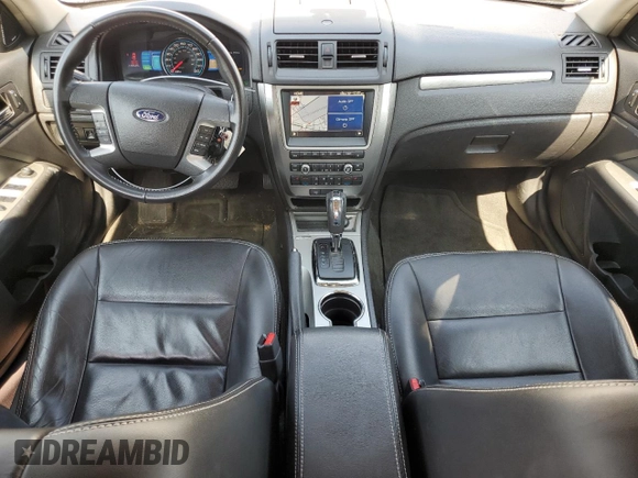 2011 Ford Fusion Hybrid с VIN 3FADP0L35BR317400, выставлен на аукционе Copart как лот 60225545 с пробегом 118 370 миль миль и Списание • Salvage title. История ставок и продаж доступна на DreamBid. Изображение 8.