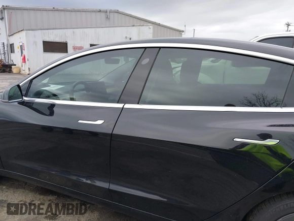 2019 Tesla Model 3 Mid Range with VIN 5YJ3E1EA3KF313425, listed as a IAAI auction lot 41806388 with 110,767 mi miles and . Bid and sale history available at carsss.com. Image 14.