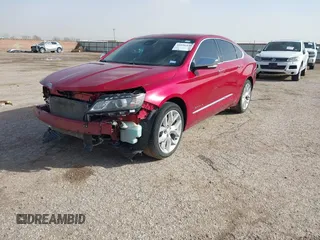 2014 Chevrolet Impala LTZ with VIN 1G1145SL0EU169876, listed as a IAAI auction lot 41696439 with 121,453 mi miles and . Bid and sale history available at DreamBid. Image 2.