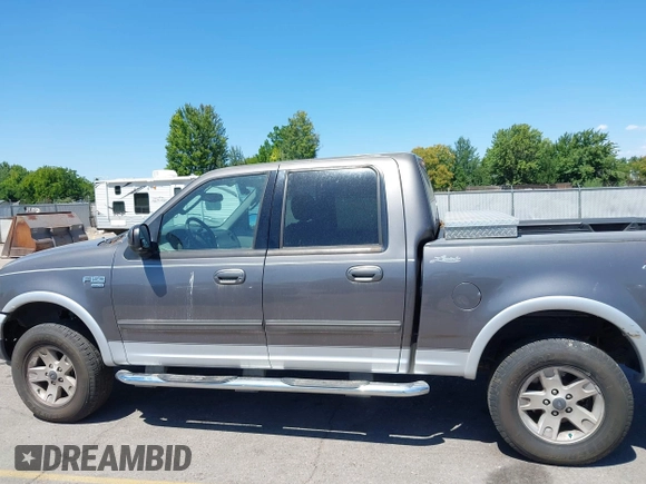 2003 Ford F-150 XLT with VIN 1FTRW08L63KD17116, listed as a IAAI auction lot 42811062 with Not provided miles and . Bid and sale history available at DreamBid. Image 14.