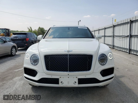 2019 Bentley Bentayga V8 z VIN SJAAM2ZV0KC026362, wystawiony jako Copart lot #54059393 z przebiegiem 31 530 mil mil oraz . Historia ofert i sprzedaży dostępna na DreamBid. Obrazek 5.