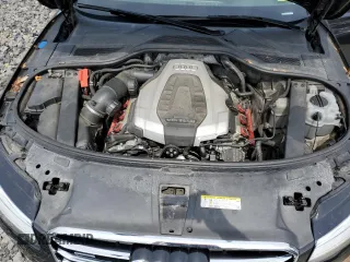 2015 Audi A8 3.0T with VIN WAU3GAFD0FN036465, listed as a Copart auction lot 64069035 with 100,149 mi miles and Salvage title. Bid and sale history available at DreamBid. Image 11.