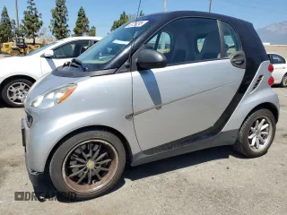 2009 Smart fortwo Pure with VIN WMEEJ31X79K223915, listed as a Copart auction lot 63120295 with 98,178 mi miles and Clean title. Bid and sale history available at DreamBid. Image 1.