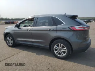 2019 Ford Edge SEL z VIN 2FMPK4J9XKBC67141, wystawiony jako Copart lot #60271615 z przebiegiem 100 400 mil mil oraz Szkoda całkowita • Salvage title. Historia ofert i sprzedaży dostępna na DreamBid. Obrazek 2.