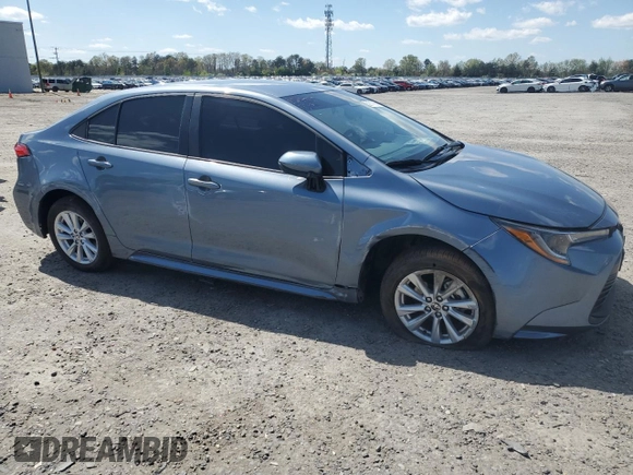2024 Toyota Corolla LE with VIN 5YFB4MDE1RP183731, listed as a Copart auction lot 52217665 with 9,402 mi miles and Salvage Title. Bid and sale history available at carsss.com. Image 4.