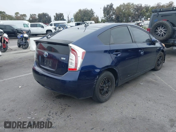 2014 Toyota Prius Four with VIN JTDKN3DU7E1779813, listed as a IAAI auction lot 42395989 with 148,626 mi miles and . Bid and sale history available at DreamBid. Image 4.