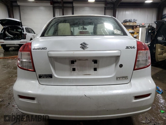 2011 Suzuki SX4 LE z VIN JS2YC5A29B6302397, wystawiony jako Copart lot #82691304 z przebiegiem 251 382 mil mil oraz Szkoda całkowita • Salvage title. Historia ofert i sprzedaży dostępna na DreamBid. Obrazek 6.