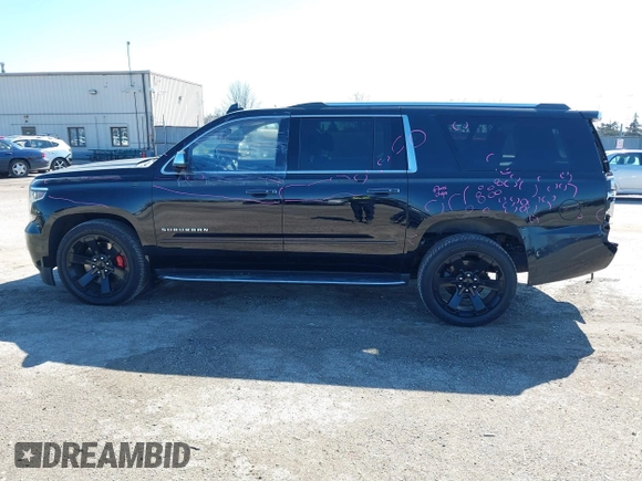 2017 Chevrolet Suburban Premier with VIN 1GNSKJKC8HR285321, listed as a IAAI auction lot 41796659 with 128,113 mi miles and . Bid and sale history available at DreamBid. Image 14.