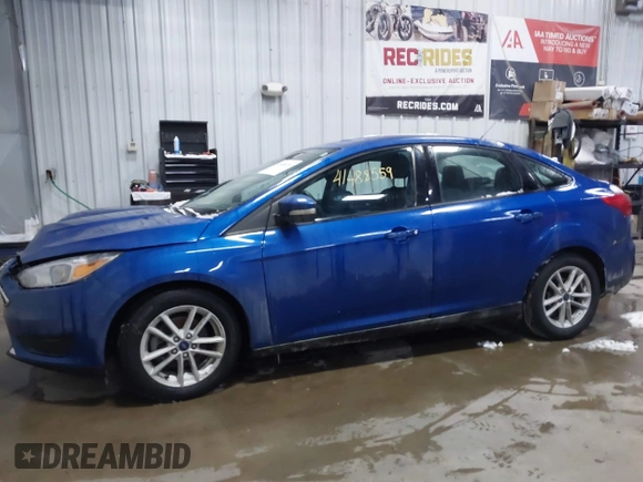 2018 Ford Focus SE z VIN 1FADP3F26JL312725, wystawiony jako IAAI lot #41488559 z przebiegiem 30 686 mil mil oraz . Historia ofert i sprzedaży dostępna na DreamBid. Obrazek 14.