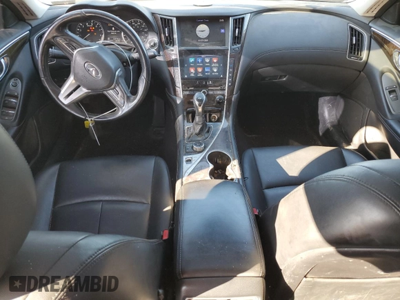 2019 Infiniti Q50 Luxe with VIN JN1EV7AP8KM514379, listed as a Copart auction lot 46948985 with 103,756 mi miles and Salvage title. Bid and sale history available at DreamBid. Image 8.