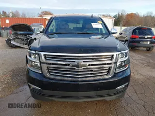 2020 Chevrolet Suburban Premier with VIN 1GNSCJKC0LR121728, listed as a IAAI auction lot 41105003 with 43,820 mi miles and . Bid and sale history available at DreamBid. Image 12.